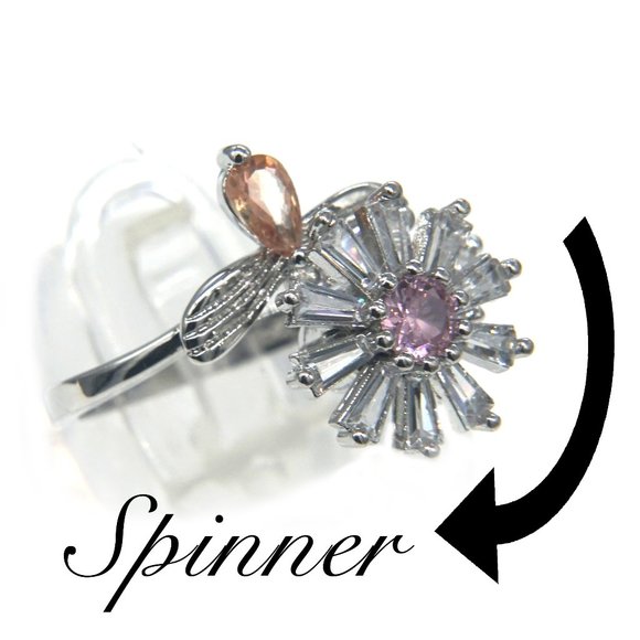 Silver ring with CZ Daisy, has pink center stone and topaz accent. - Picture 2 of 5